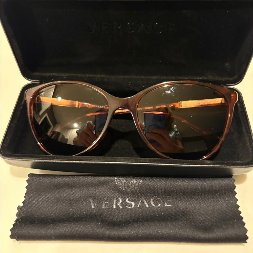 Versace sunglasses featuring